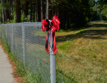 Load image into Gallery viewer, "Firefighters First" - First Responder Bow, Red Ribbon with Narrower Black Styling Ribbon. Curling Ribbon Adds the Accents. 9" Wide, 6" tall with 14" Tails